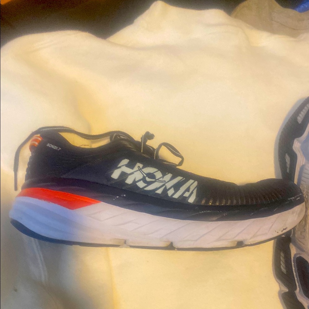 Hoka Navy and Orange Running Shoes
Bondi 7